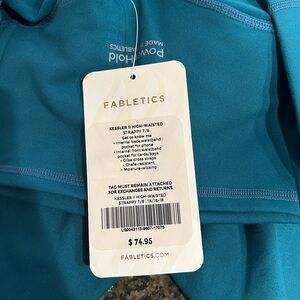 Fabletics Kessler High Waisted Ocean Blue Strappy 7/8 length Leggings. Size 1x